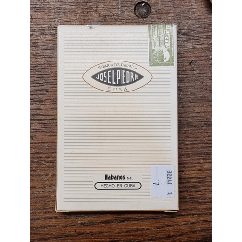 1496 - Cigars: a sealed box of 5 Jose L Piedra 'Brevas' cigars.