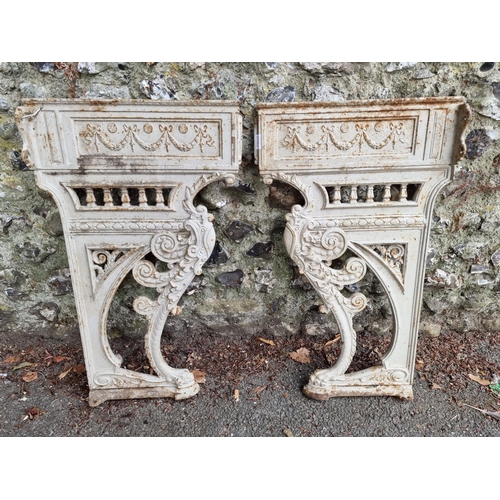 1638 - A pair of antique cast iron table ends, 74.5cm high x 45cm deep.