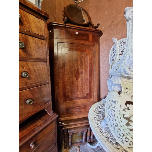 1642 - An antique mahogany corner cupboard; together with a reproduction nest of three tables and a toilet ... 