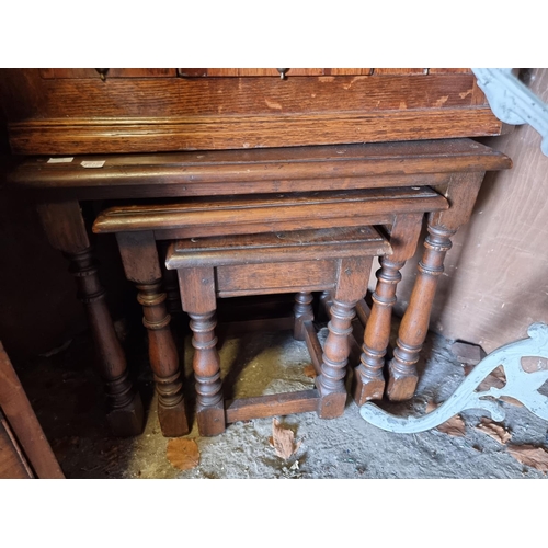 1642 - An antique mahogany corner cupboard; together with a reproduction nest of three tables and a toilet ... 