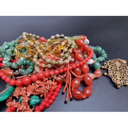 228 - A coral necklace; together with various natural stone necklaces and costume jewellery.... 