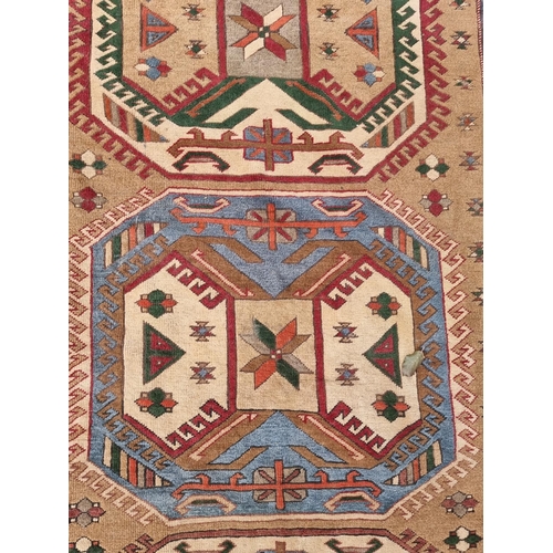 1001 - A Persian rug, having three central medallions, with geometric borders, 221 x 139cm; together with a... 