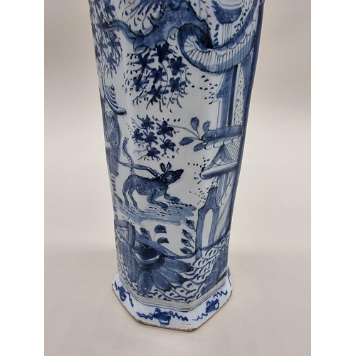 1359 - A tin glazed pottery delftware vase and cover, 18th/19th century, painted with a Chinese figure, 35.... 