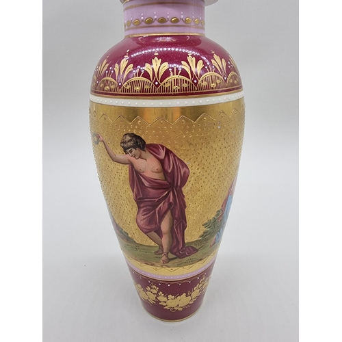 1360 - An interesting Vienna porcelain vase and cover, finely painted with classical figures against a gilt... 