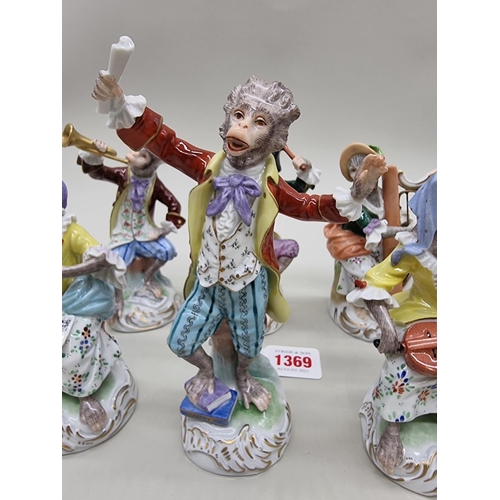 1369 - A set of twelve Dresden monkey band figures, largest 16cm high. 