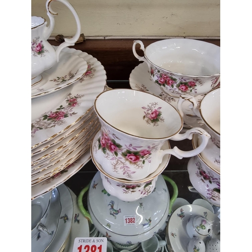 1381 - A Royal Albert 'Lavender Rose' pattern part tea and dinner service; together with another Royal Albe... 