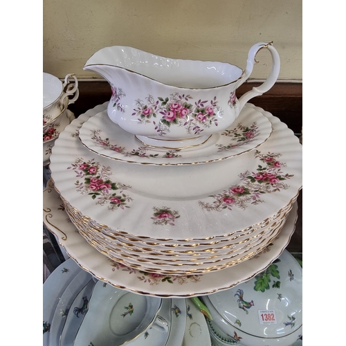 1381 - A Royal Albert 'Lavender Rose' pattern part tea and dinner service; together with another Royal Albe... 