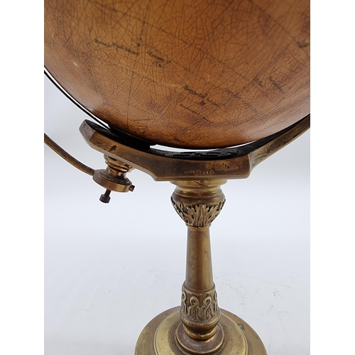 1389 - A scarce early 20th century globe timepiece, inscribed 'The Empire Clock', 39cm high, (faults).... 