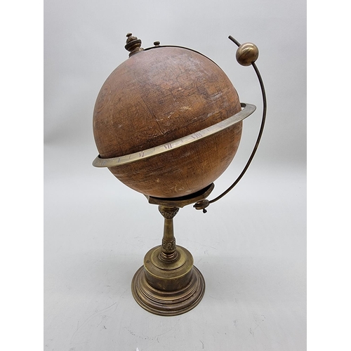 1389 - A scarce early 20th century globe timepiece, inscribed 'The Empire Clock', 39cm high, (faults).... 