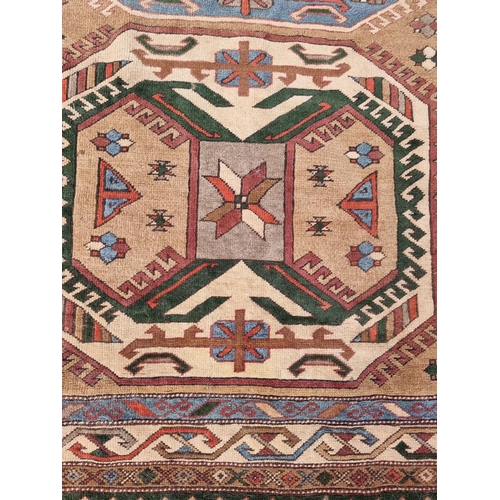 1001 - A Persian rug, having three central medallions, with geometric borders, 221 x 139cm; together with a... 