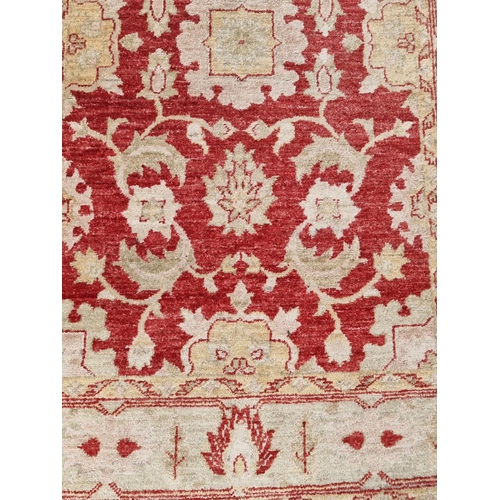 1006 - A Persian rug, having allover floral decoration on a cream ground, 156 x 100cm.