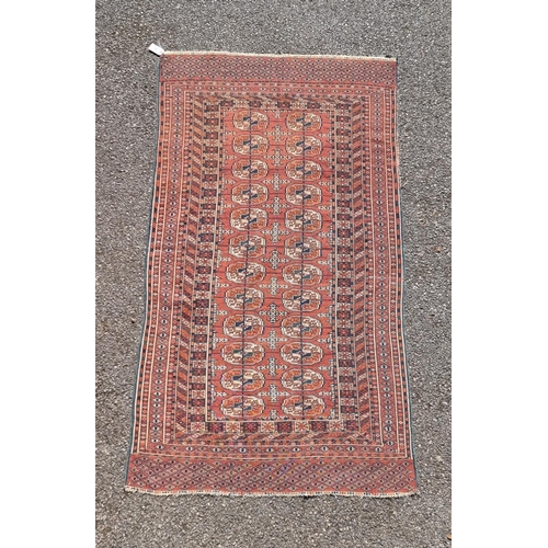 1007 - A Bokhara rug, having repeated decoration to central field, with geometric borders, 193 x 107cm.... 