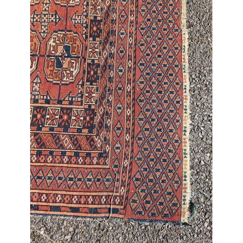 1007 - A Bokhara rug, having repeated decoration to central field, with geometric borders, 193 x 107cm.... 