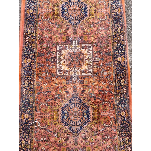 1008 - A modern Persian runner, having geometric design, 328 x 70; together with a similar rug, 174 x 80cm.... 