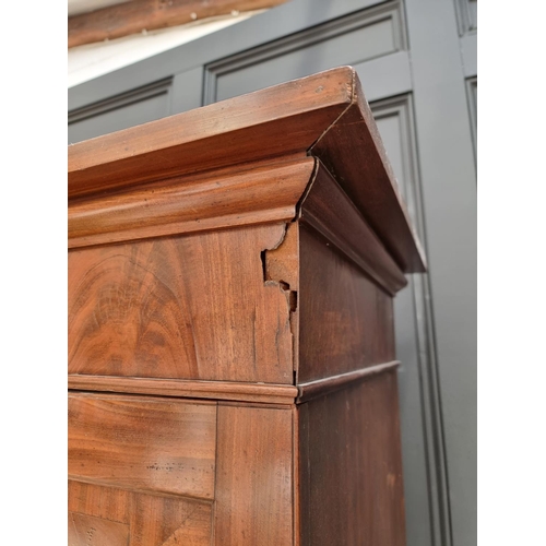 1014 - A 19th century mahogany double wardrobe, 111.5cm wide, converted.