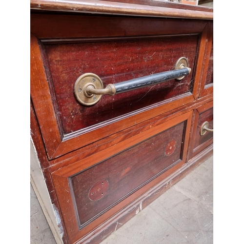 1015 - A large antique mahogany shop counter, with six drawers, 234cm wide, (a.f.).