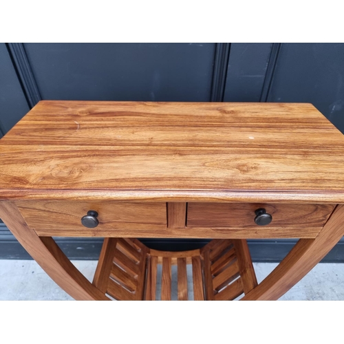 1020 - A hardwood occasional table, 61cm wide.