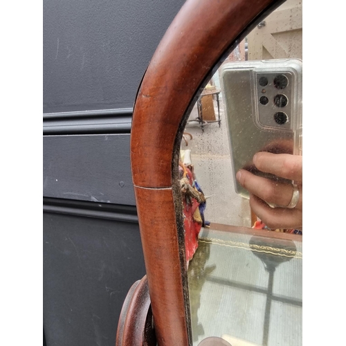 1030 - A Victorian mahogany toilet mirror, 53.5cm wide.