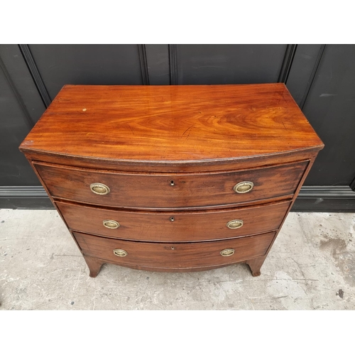 1036 - An early 19th century mahogany bowfront chest of drawers, 92cm wide. 