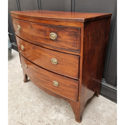 1036 - An early 19th century mahogany bowfront chest of drawers, 92cm wide. 