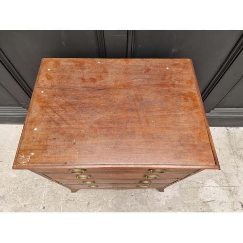 1038 - An antique mahogany commode chest, 64cm wide.  