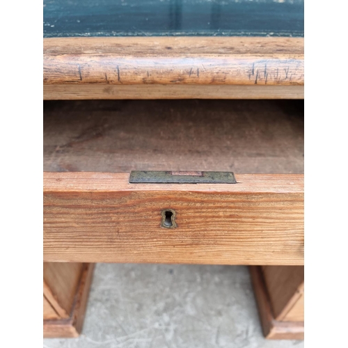 1046 - A 19th century pine pedestal desk, 119.5cm wide. 