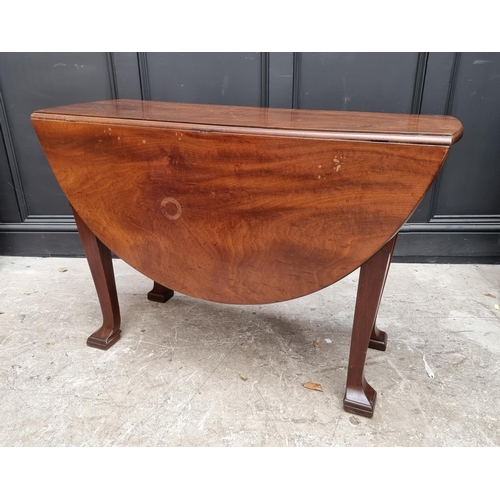 1061 - An antique mahogany gateleg table, possibly Irish, 107cm long.