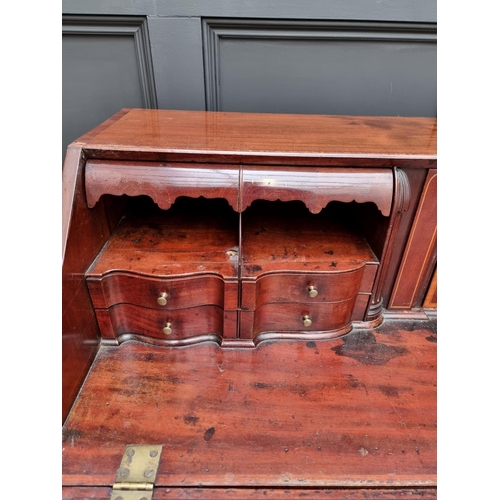 1066 - A George III mahogany and inlaid bureau, 117.5cm wide. 