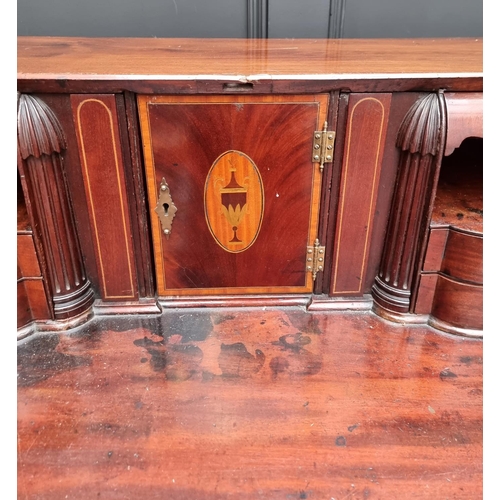 1066 - A George III mahogany and inlaid bureau, 117.5cm wide. 