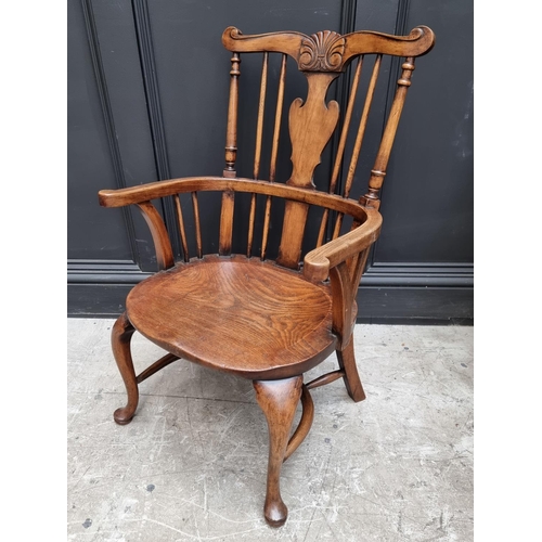 1074 - A small 18th century style ash, elm and beech Windsor armchair. 