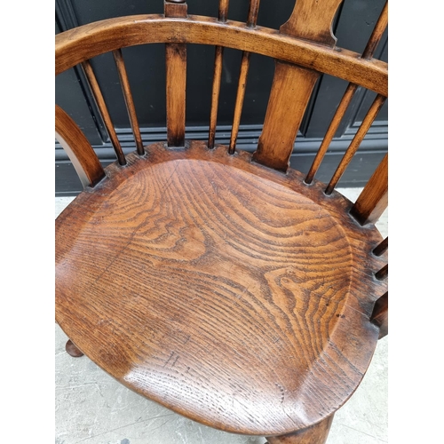 1074 - A small 18th century style ash, elm and beech Windsor armchair. 