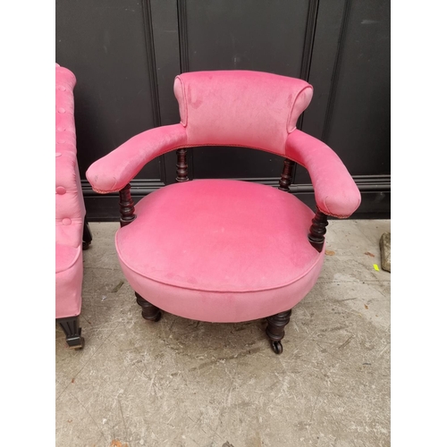 1075 - Two late Victorian ebonized and pink velvet upholstered low occasional chair. (2)  ... 