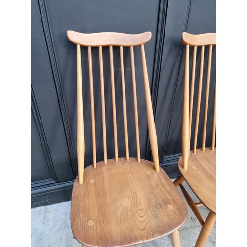 1078 - A set of four vintage Ercol 'Goldsmith' dining chairs. 