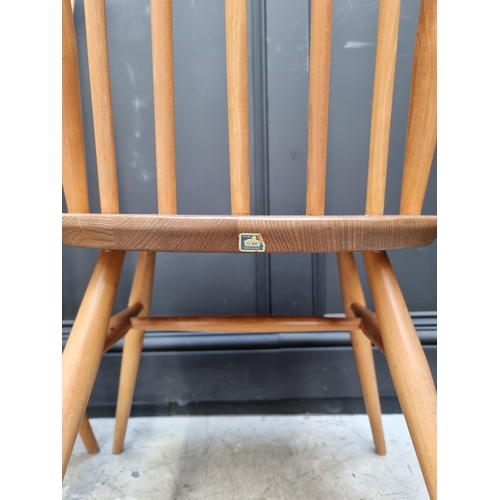 1078 - A set of four vintage Ercol 'Goldsmith' dining chairs. 