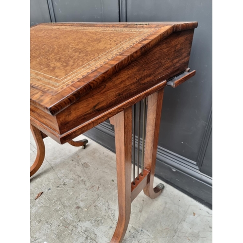 1084 - An unusual 19th century rosewood Davenport type desk, with two small lateral slides, 70cm wide.... 