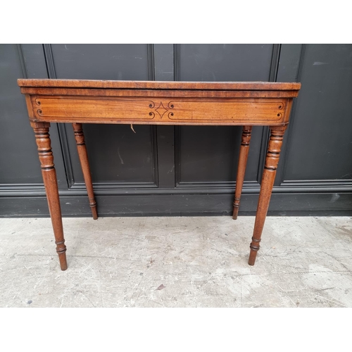 1089 - A Regency mahogany and line inlaid card table, with double gateleg, 91.5cm wide.  ... 