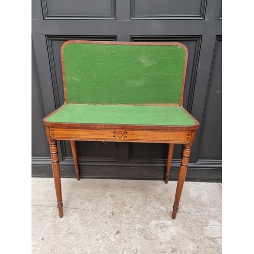 1089 - A Regency mahogany and line inlaid card table, with double gateleg, 91.5cm wide.  ... 