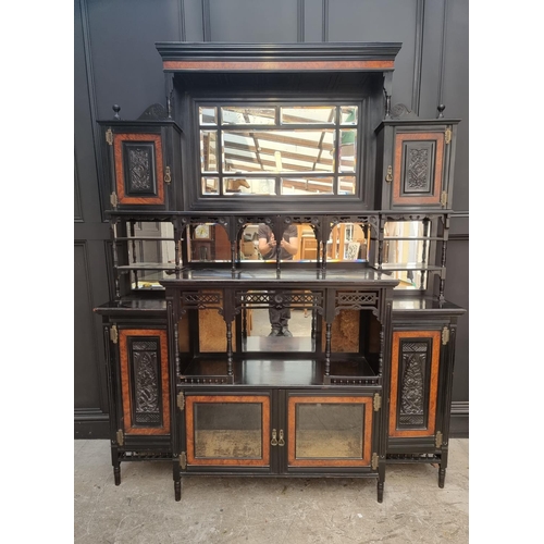 1098 - A large and impressive Aesthetic ebonized and amboyna mirror back side cabinet, 168.5cm wide.... 