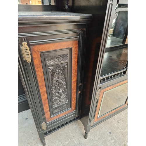 1098 - A large and impressive Aesthetic ebonized and amboyna mirror back side cabinet, 168.5cm wide.... 