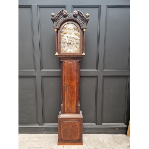 1100 - A George III oak and mahogany crossbanded eight day longcase clock, the 12in arched silvered dial in... 