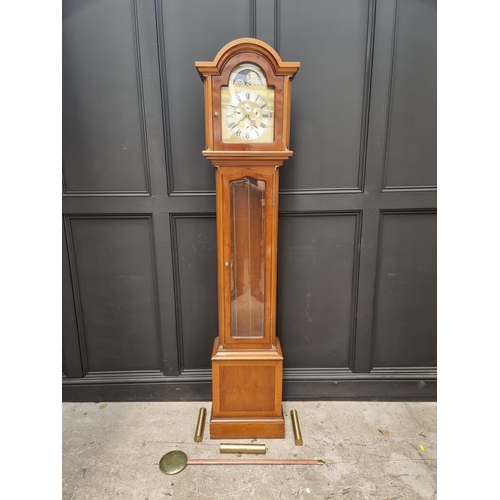 1101 - A small reproduction yew longcase clock, with moonphase arch, chiming on eight straight gongs, 195cm... 