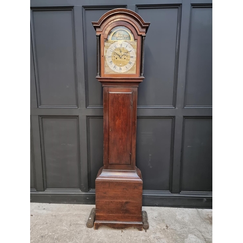 1105 - A George III stained oak and pine longcase clock, the 12in brass and silvered dial with rocking ship... 