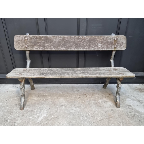 1108 - A Victorian cast iron bench, with naturalistic branch form supports, 152.5cm wide. ... 