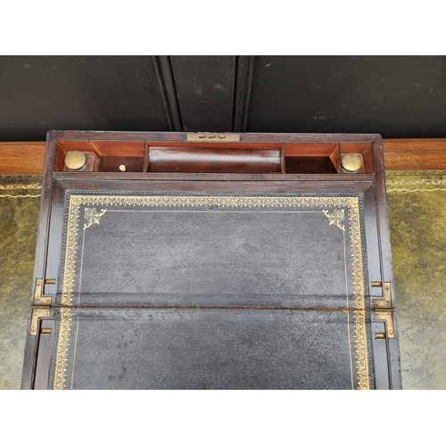 1118 - A large Victorian figured walnut and gilt brass bound writing slope, 50.5cm wide. ... 