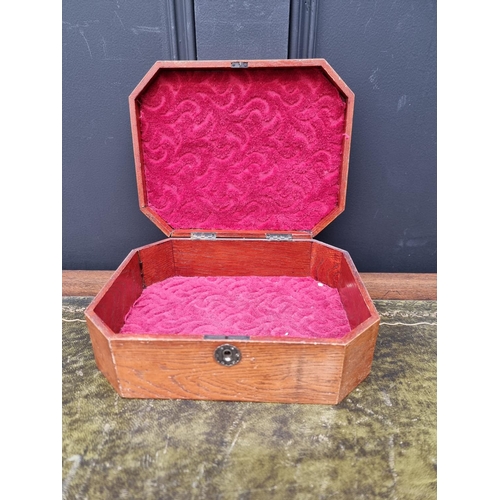 1121 - A Japanese elm and bone casket, of canted rectangular form, 23cm wide. 