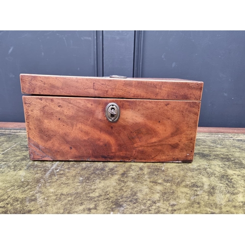 1127 - An early 19th century mahogany and line inlaid tea caddy, 30.5cm wide, with key.... 