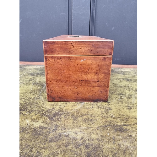 1127 - An early 19th century mahogany and line inlaid tea caddy, 30.5cm wide, with key.... 