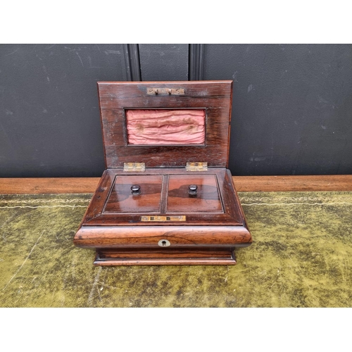 1128 - A Victorian rosewood bombe sarcophagus tea caddy, 25cm wide, (lacking feet).