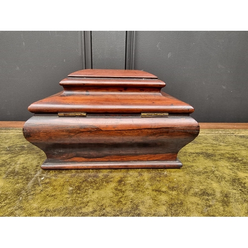 1128 - A Victorian rosewood bombe sarcophagus tea caddy, 25cm wide, (lacking feet).