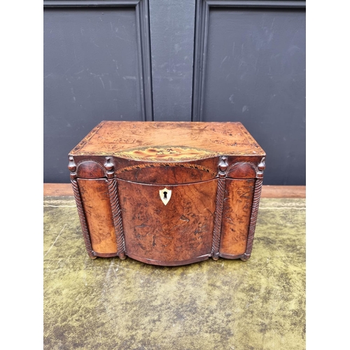 1129 - A very unusual late 18th century walnut and inlaid bowfront workbox, possibly Irish, the interior wi... 